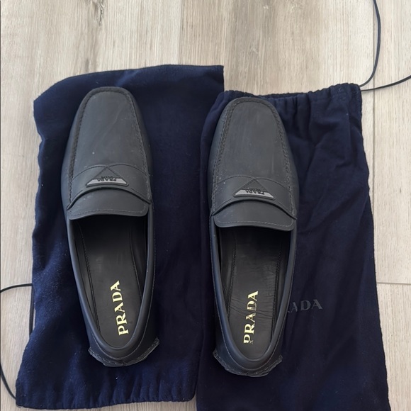 Prada Black Leather Slip-On Loafers with Minimalist Design - Picture 1 of 6